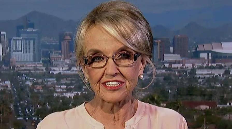 Jan Brewer on DOJ suing California over immigration laws