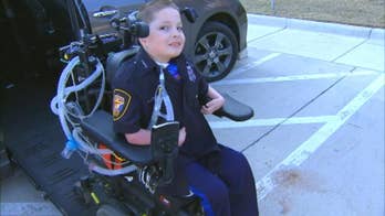 10-year-old boy in wheelchair becomes cop for a day