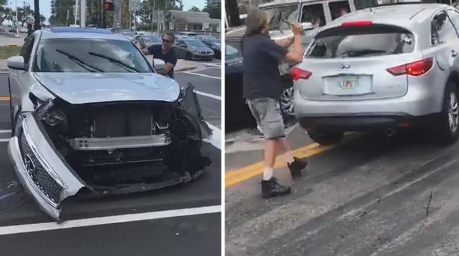 Man smashes out windows of SUV trying to flee accident scene
