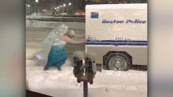 'Elsa' pushes Boston police vehicle out of snow bank