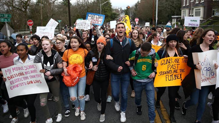 Mass student walkout one month after Parkland, Florida shooting