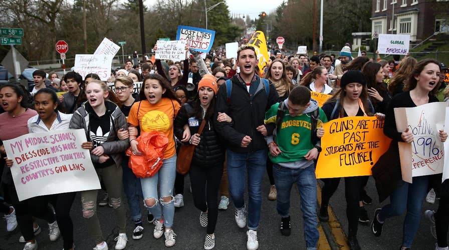 Mass student walkout one month after Parkland, Florida shooting