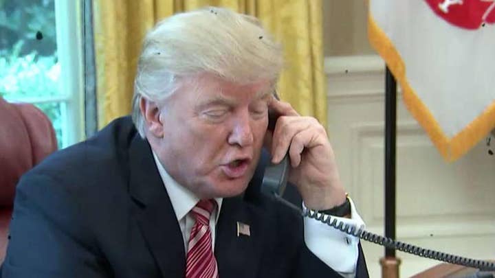 President Trump defends congratulatory call to Putin