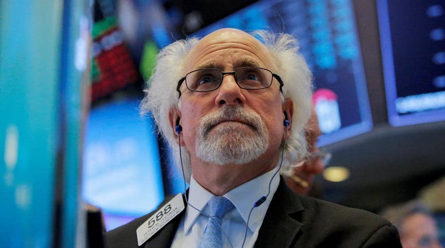 Dow closes more than 700 points down