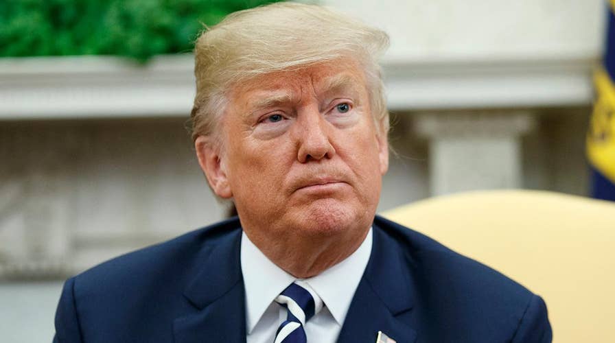 Trump threatens to veto spending bill over DACA, border wall