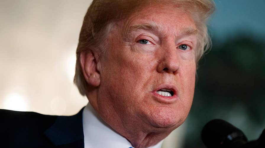 Trump uses signing ceremony to deliver warning to Congress