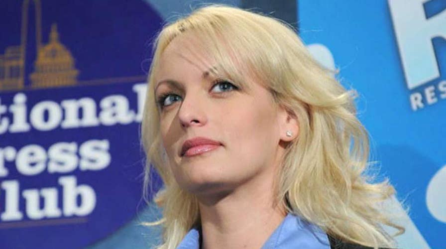 Stormy Daniels says she was warned to keep quiet