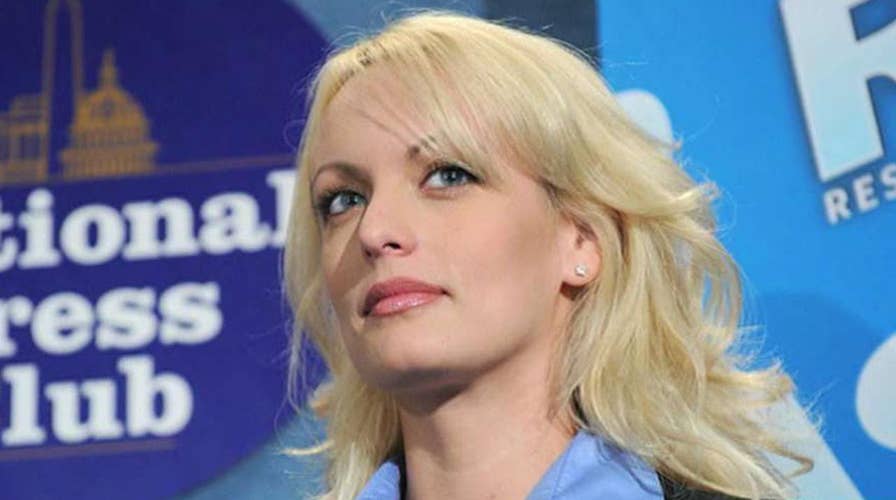 Stormy Daniels says she was warned to keep quiet