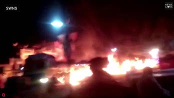 Dramatic video captures blazing fuel truck being driven to safety through Indian city