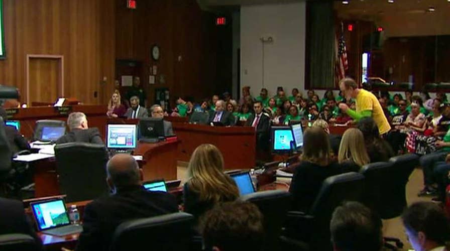 Orange County joins fight against state's sanctuary status