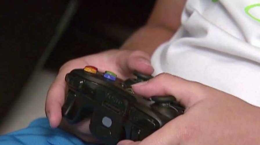 Parents juggle pros and cons of kids' technology use