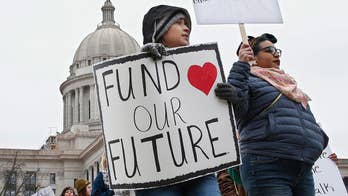 Kentucky, Oklahoma teachers walk out of classrooms to demand higher pay, more funding