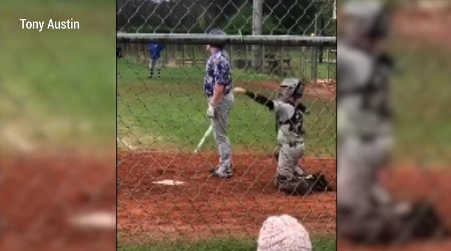 Watch: One-armed high school baseball catcher inspires