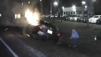Driver in burning vehicle rescued by two Good Samaritans, police say
