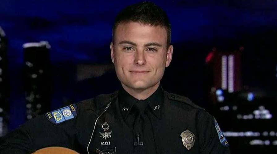 Georgia police officer goes viral for 'hug a cop' campaign