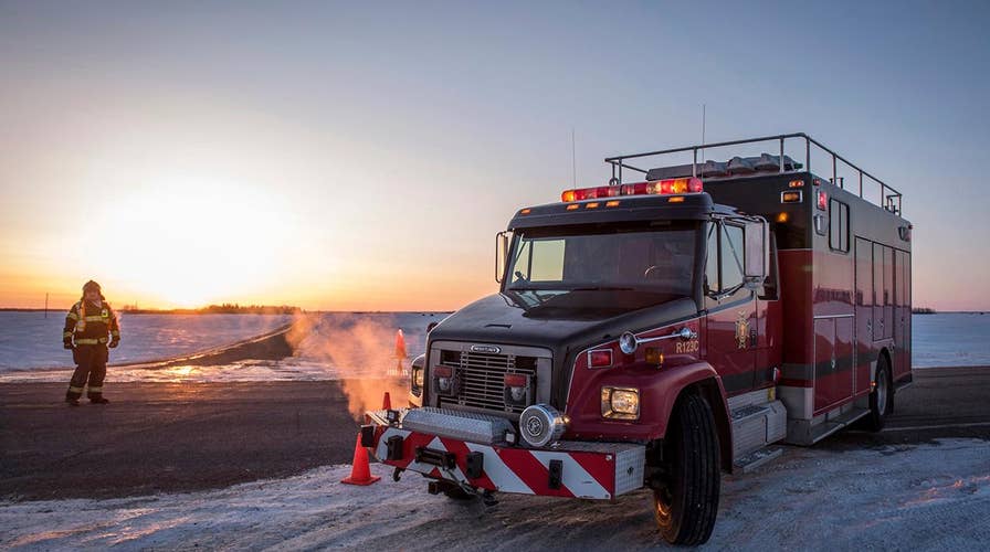 14 killed after bus carrying hockey team collides with truck