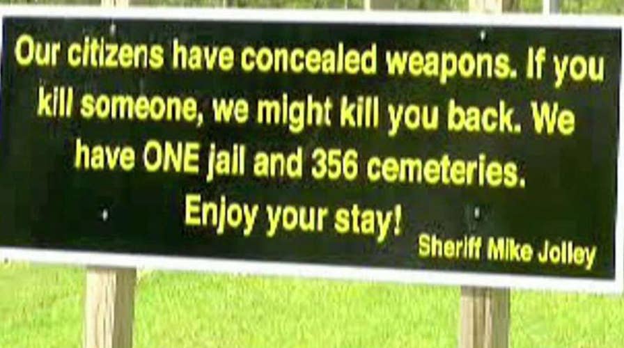 Georgia 'welcome' sign warns that locals are armed