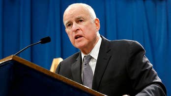 Jerry Brown bolsters National Guard but defends California's sanctuary status