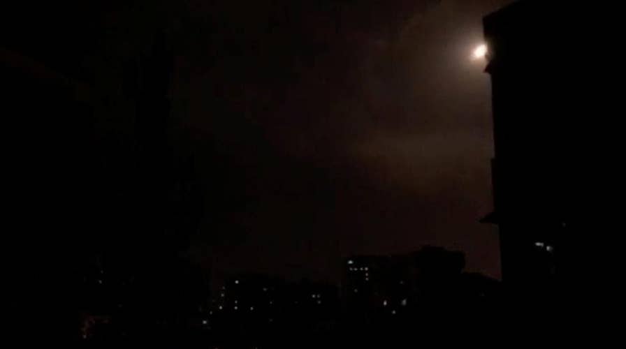 Russia reacts after US, UK and France strike Syria