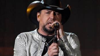 Jason Aldean wins ACM Awards' Entertainer of the Year at show focusing on healing through music after Las Vegas shooting