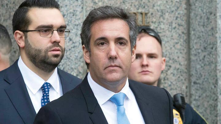Lawyers clash over Cohen raid documents and client lists
