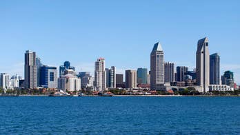 San Diego cop rescues twin girls, 2, after dad drives off cliff, investigators say