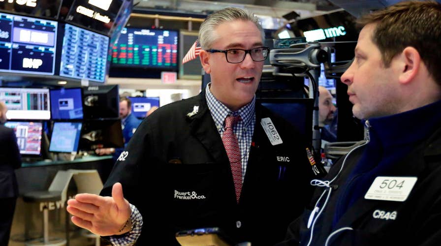 Stocks soar on optimism for strong earnings season