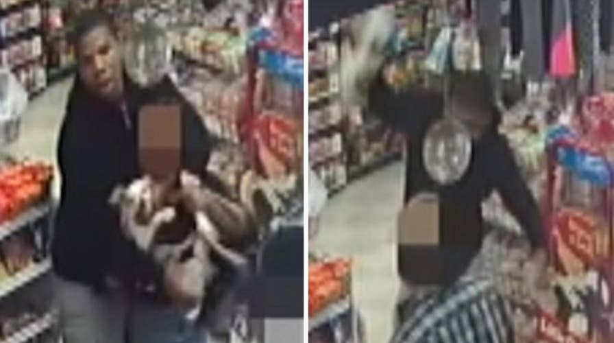 Warning, graphic content: Man violently slams puppy to floor