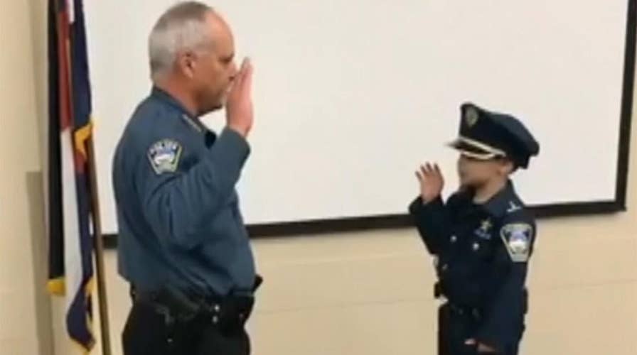 Little boy battling cancer sworn in as police officer