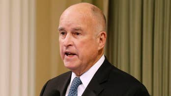 California Gov. Jerry Brown issues order deploying 'up to 400' National Guard troops but lays out strict terms