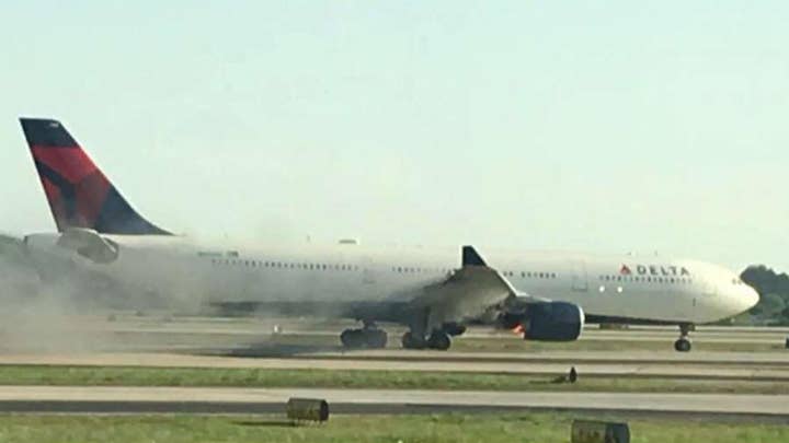 Video shows smoke billowing from Delta plane