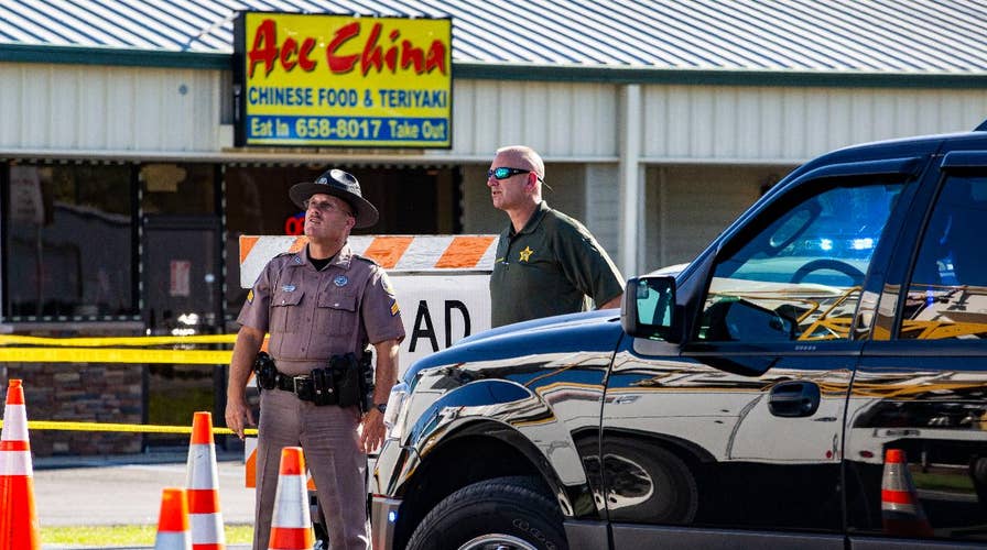 Two Florida deputies shot dead in apparent ambush