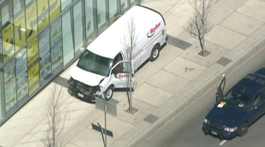 Police: Van jumps curb, strikes pedestrians in Toronto