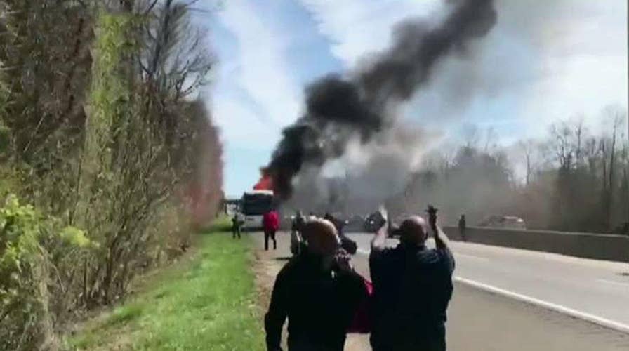 Dr. Oz helps students escape a raging bus fire