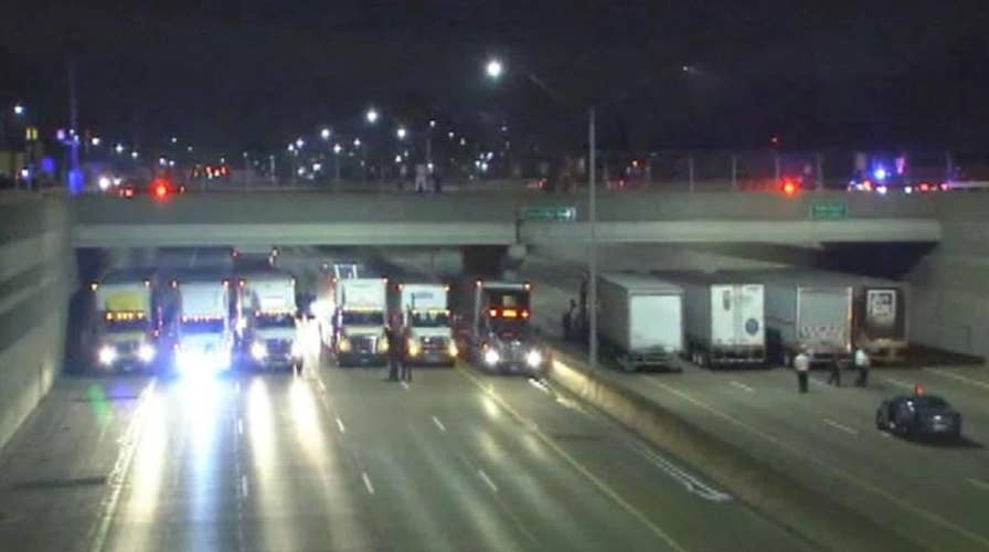 13 truck drivers hailed heroes for helping a suicidal man