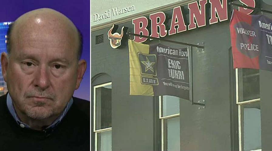 Flags honoring fallen police officers ordered taken down