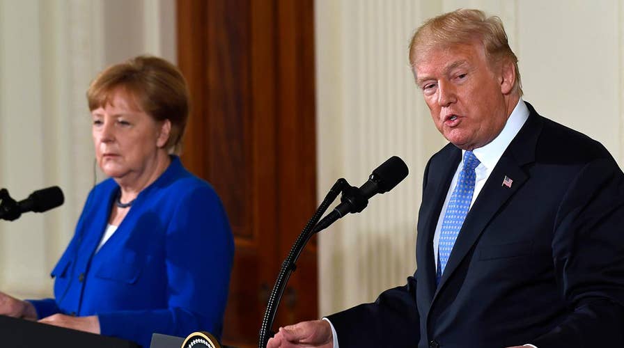 Trump hosts Merkel as North and South Korean leaders meet