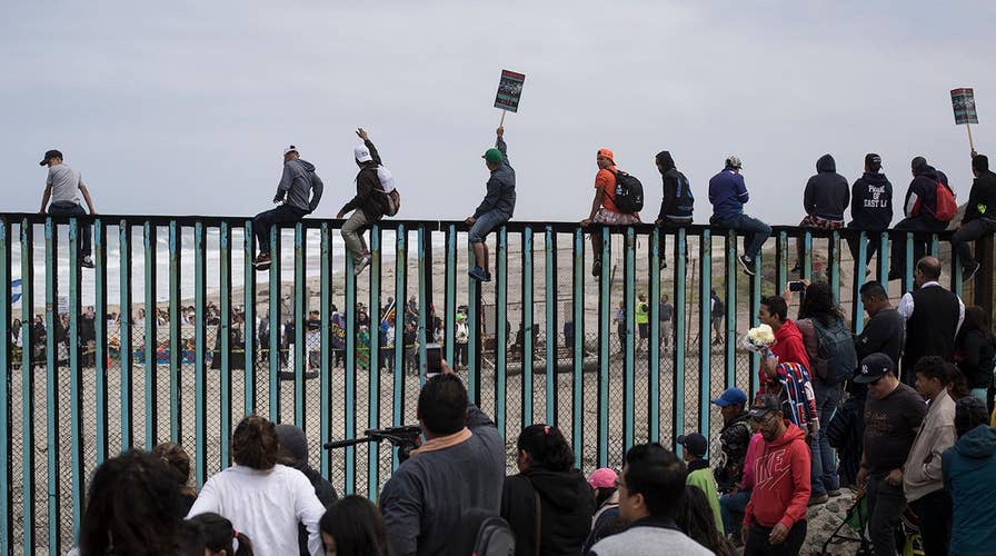Migrant caravan seeking asylum arrives at US border
