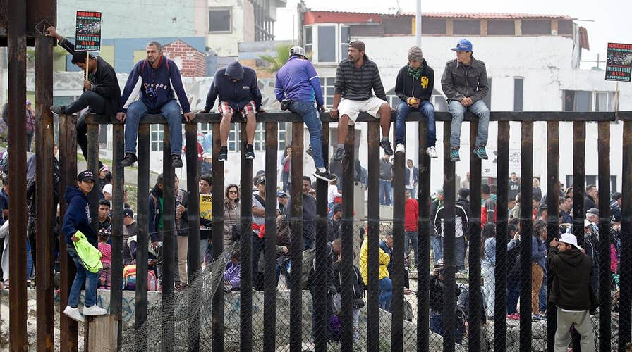 Caravan reaches US-Mexico border in California