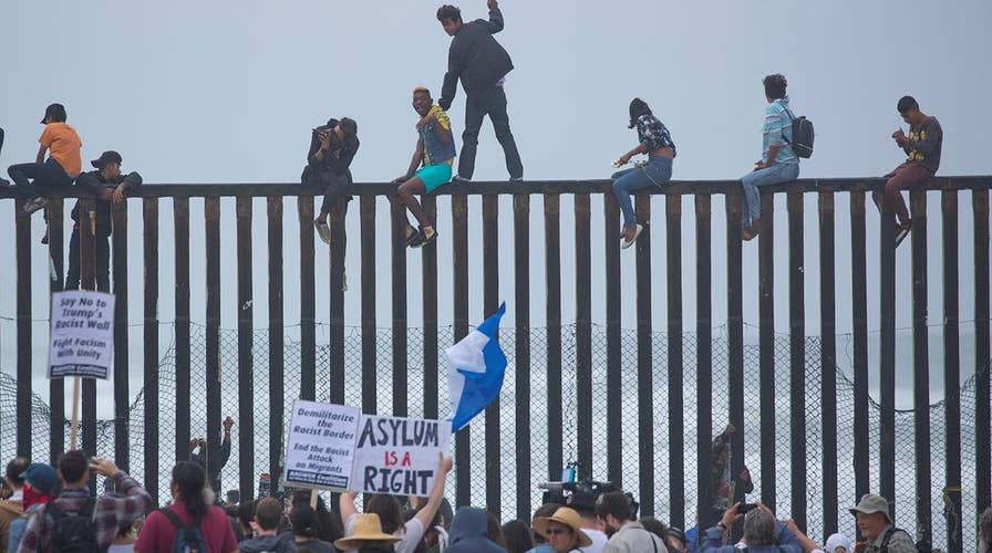 Optics of 'caravan' helping White House make its case?