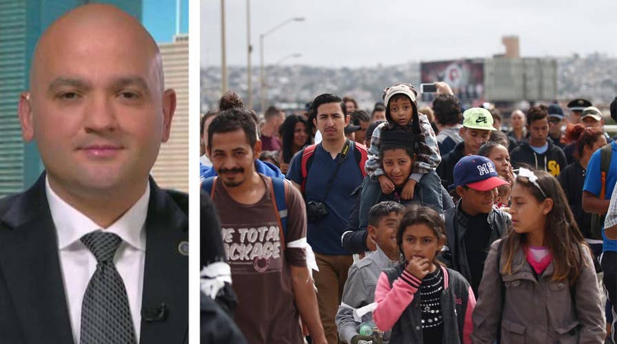 Border agents react to migrants demanding entry into the US