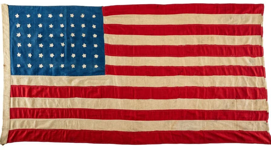 100-year-old US flag made for WWI soldiers returns home