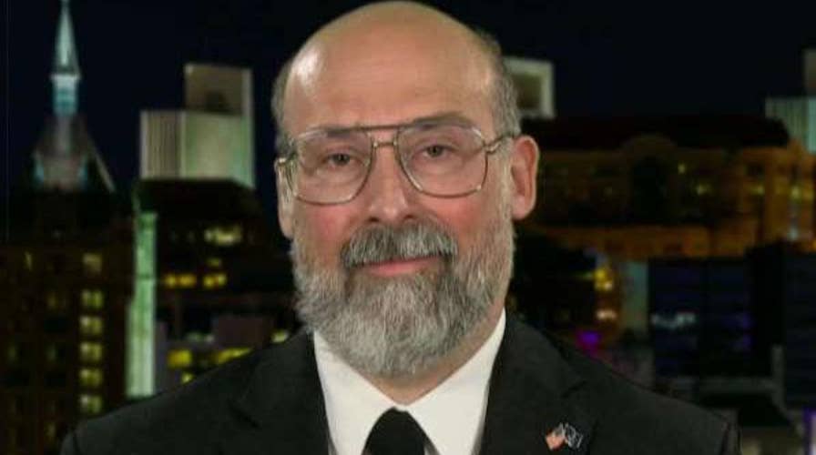 Professor says he was fired for defending free speech