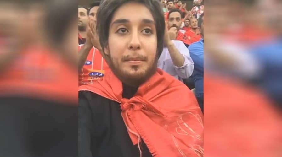 Iranian woman wears fake beard while attending soccer match