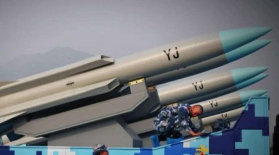 US warns China of 'consequences' over militarization