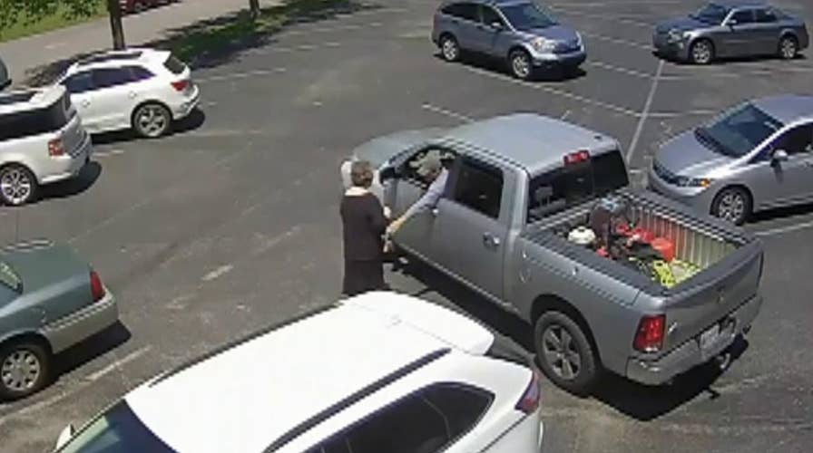 Raw video: Elderly woman robbed while leaving church