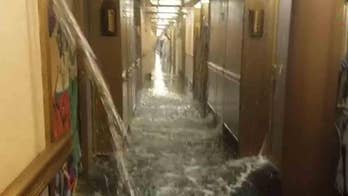 Footage shows Carnival cruise flooding with water due to issue with fire system