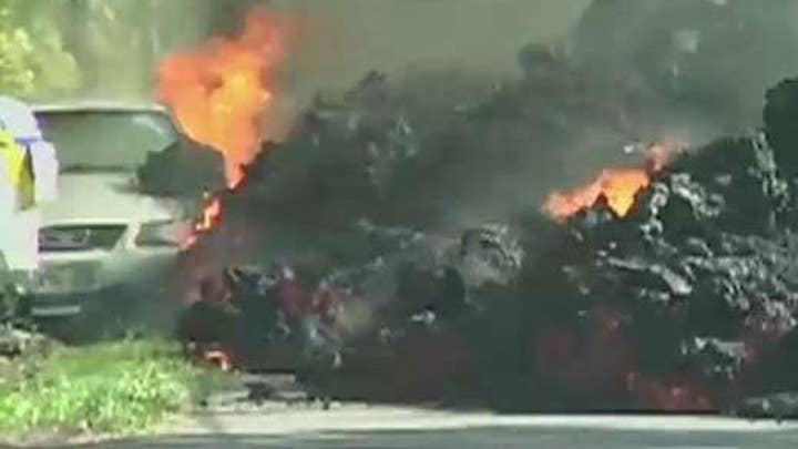 Lava engulfs cars, homes on Hawaii's Big Island