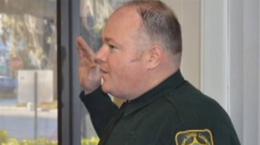 Florida deputy shot, killed responding to dispute over cat