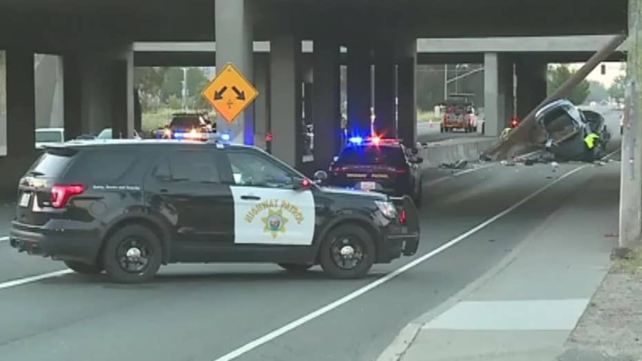 Car nearly folds in half after driving off freeway, crashing into utility pole | Fox News